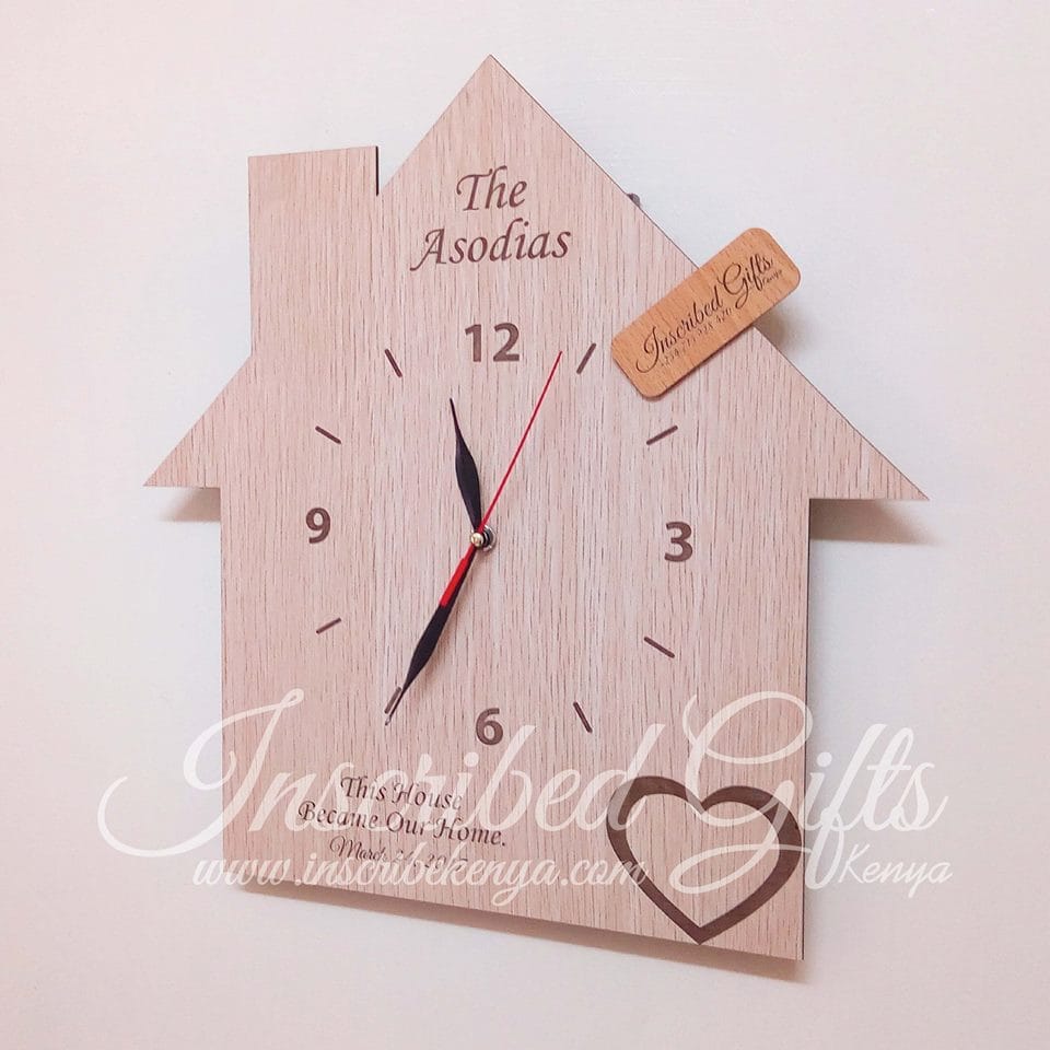 House shaped wooden wall clock